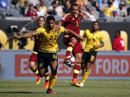 El duelo entre Jamaica y Venezuela fue muy disputado en todo momento. AP / C.Arbogast