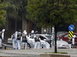 Forenses inspeccionan el sitio donde ocurrió el ataque, que tuvo lugar a primera hora de la mañana. AP / E. Gurel