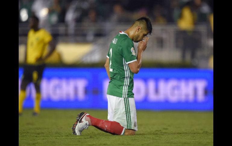 ''Nos equivocamos, bueno, yo me equivoqué en jugadas puntuales'', admite Néstor Araujo. AP / M. Terrill