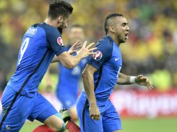 Los goles de los bleus fueron de Dimitri Payet y Olivier Giroud (izq). AP / M. Meissner