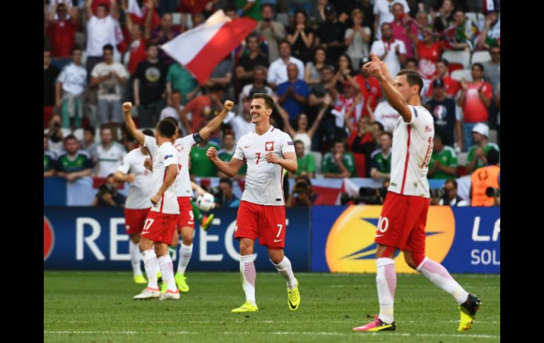 Polonia dio un paso adelante para lograr superar la primera fase, algo que no consigue desde el Mundial de 1986. AFP / A. Poujoulat