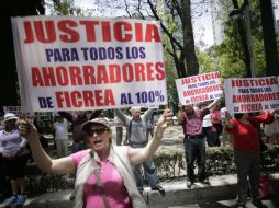 Manifestación de ahorradores defraudados frente a las oficinas de la Procuraduría General de la República. SUN / I. Stephens