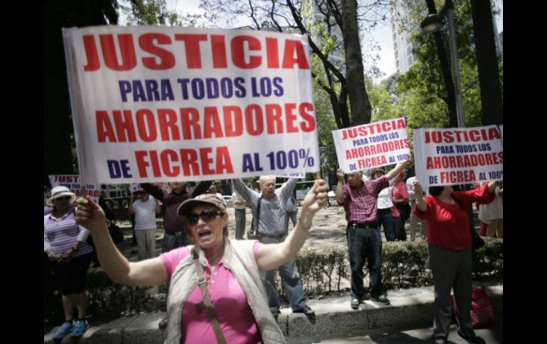 Manifestación de ahorradores defraudados frente a las oficinas de la Procuraduría General de la República. SUN / I. Stephens