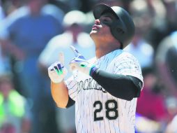 Destacado. Nolan Arenado estuvo encendido con el madero durante el juego de ayer entre Rockies y Yankees. AP / D. Zalubowski