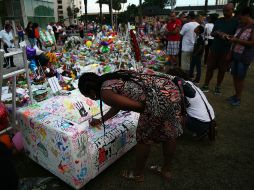 Las despedidas comenzaron el miércoles con el velatorio de un vendedor de 40 años también puertorriqueño. AFP / S. Platt