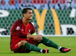 Ronaldo se lamenta tras fallar el penal. EFE / A. Taherkenareh