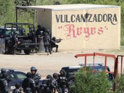 La CNS acusó que las imágenes de policías con armas en la entidad que circulan son falsas y se investigarán. AP / L. Cruz