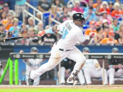 Marcell Ozuna. El dominicano pegó un cuadrangular de tres carreras en el sexto episodio. AP /