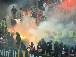 Algunos ciudadanos han tenido que ser deportados, debido a la violencia presentada en los estadios. AFP / B. Langlois