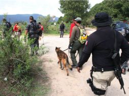 Uniformados en la búsqueda de Andrés Barba y Luis Ortiz en el rancho La Cebada, dentro de La Primavera, en 2013. EL INFORMADOR / ARCHIVO