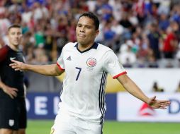 Carlos Bacca fue el anotador del solitario gol que le dio el premio de consolación a Colombia. AFP / C. Petersen