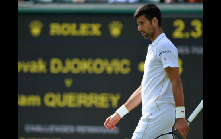 En un partido interrumpido por la lluvia, Djokovic se quedó sin la posibilidad de ganar su tercer Grand Slam del año. AFP / G. Kirk