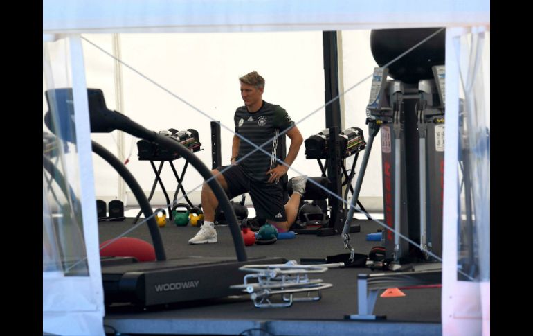 Schweinsteiger  se contentó con hacer una sesión de bicicleta estática y ejercicios diversos. AFP / P. Stollarz