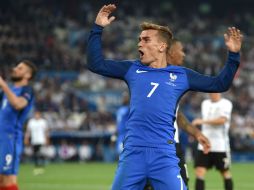 Antoine Griezmann anotó las dos ocasiones, la primera de penal  y la segunda al aprovechar una mala salida del portero Neuer. EFE / P. Powell