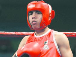 Joselito Velázquez se llevó la presea de oro en la categoría de los 49 kilos, al vencer en la Final al ecuatoriano Carlos Quipo. MEXSPORT /