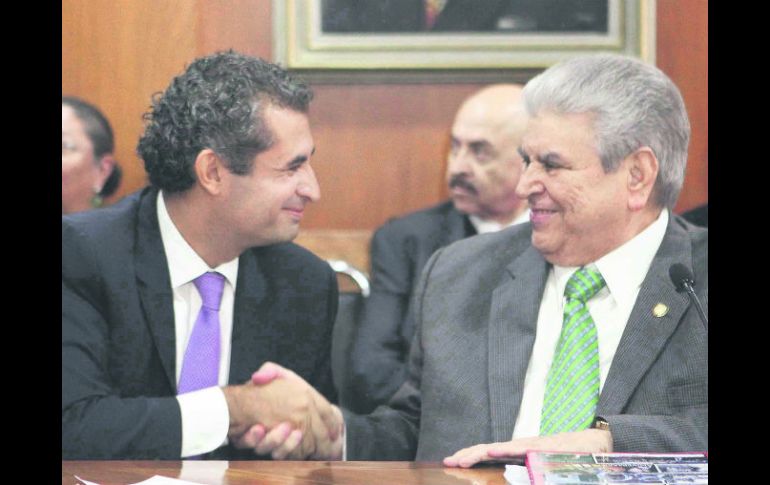 En Unión. Enrique Ochoa (izquierda) se reunió con el dirigente de la CTM, Carlos Aceves. SUN /