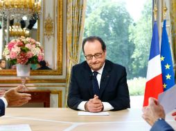 Hollande hace el anuncio en una entrevista televisada, después del desfile por el 14 de julio. AFP / F. Mori