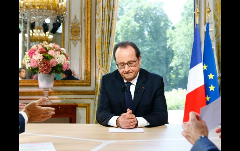 Hollande hace el anuncio en una entrevista televisada, después del desfile por el 14 de julio. AFP / F. Mori