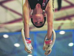 David Fregoso. El gimnasta de Jalisco fue la figura al llevarse el primer sitio en los ejercicios de anillos (foto) y manos libres. ESPECIAL / CODE