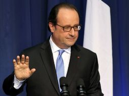 Hollande llama a la 'concordia' en este periodo que vive Francia cuyo parlamento decidió ampliar el estado de emergencia. AFP / P. Faith