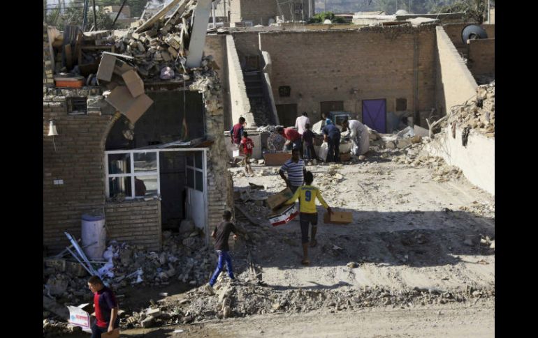 Las fuerzas de seguridad cercaron la zona del atentado, que presentaba severos destrozos. AP / ARCHIVO