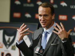 Manning rechazó tajante el reporte, tildándole de 'invento total y completa'. AP / ARCHIVO