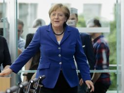 Angela Merkel presenta un plan con muchas medidas para reforzar la seguridad tras los atentados en Alemania. AP / M. Schreiber