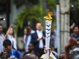 Tras recorrer 324 ciudades brasileñas, el fuego Olímpico abrirá la primera justa realizada en Sudamérica. EFE / A. Lacerda