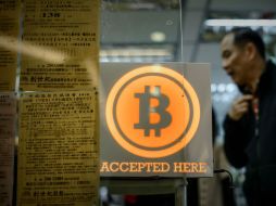 El Bitcoin es operado en la bolsa Bitfinex, en Hong Kong. AFP / P. López