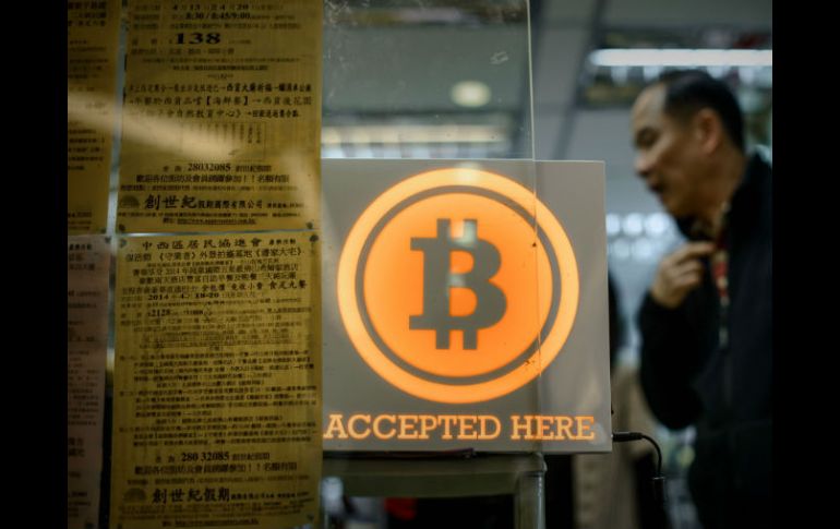 El Bitcoin es operado en la bolsa Bitfinex, en Hong Kong. AFP / P. López