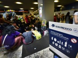 El servicio consular se encuentra al pendiente de la situación general de los afectados, en especial de sus necesidades de alimentos. AFP / G. Julien