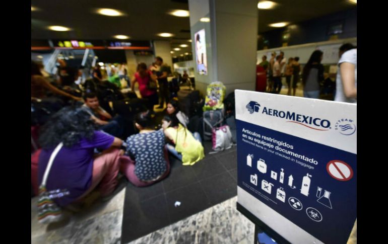 El servicio consular se encuentra al pendiente de la situación general de los afectados, en especial de sus necesidades de alimentos. AFP / G. Julien