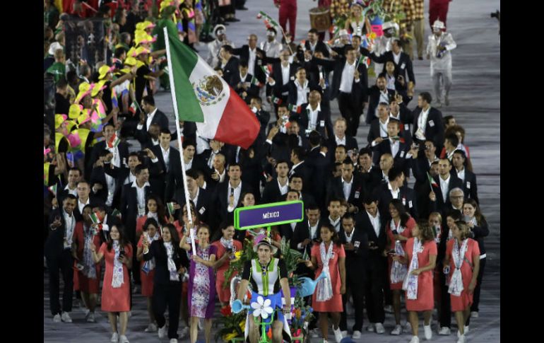 Daniela llevó la bandera mexicana y guió a la representación de los 125 deportistas de México. AP / M. Slocum