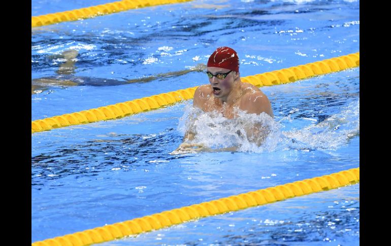 Peaty rebajó en 37 centésimas el anterior registro que él mismo poseía con un tiempo de 57.92 segundos. AFP / G. Bouys