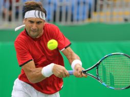 Ferrer, disputando un punto en su encuentro de la primera ronda. EFE / F.Maia