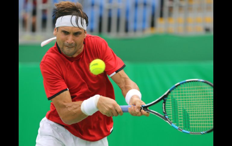 Ferrer, disputando un punto en su encuentro de la primera ronda. EFE / F.Maia