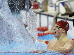 Peaty tocó la pared cuando el cronómetro marcaba 57.13 segundos, más de 40 centésimas más rápido que el sábado. AP / D. Phillip