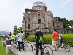 Una enorme cantidad de jugadores acudían a la Cúpula Genbaku, único edificio que quedó en pie, con peligro de dañarla. AP /