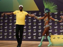 Bolt luce feliz en el país brasileño. AFP / A.Dennis