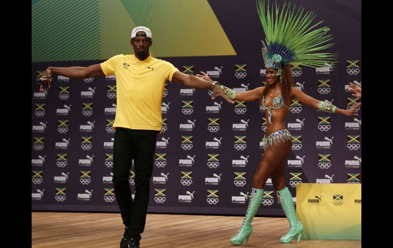 Bolt luce feliz en el país brasileño. AFP / A.Dennis