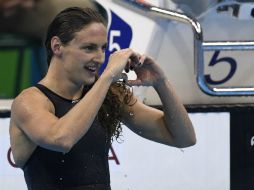 La 'dama de hierro', campeona de los 400m combinados, tocó la pared después de 58.45. AFP / C. Simon