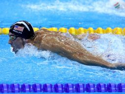 Phelps, de 31 años, compitió en el segundo grupo de la ronda semifinal y finalizó en segundo puesto con registro de 1:54.12 minutos. NTX / J. Arciga