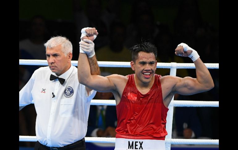 El peleador pasa a los cuartos de final, debido a que quien sería su rival en los octavos dio positivo en dopaje. MEXSPORT / O. Aguilar