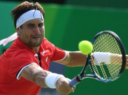 David Ferrer frustrado al no poder hacer bien su juego. AFP / R.Schmidt