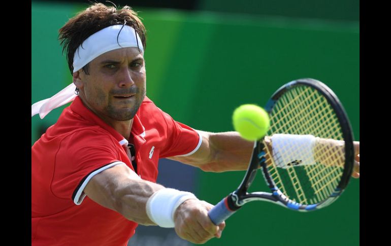 David Ferrer frustrado al no poder hacer bien su juego. AFP / R.Schmidt