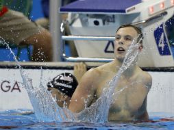 El australiano Kyle Chalmers, de 18 años, festeja al ganar el oro. AP / M. Sohn