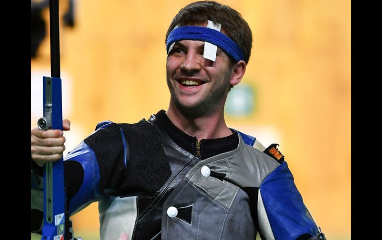 Henri Junghaenel sonriente tras ganar el oro olímpico. AFP / P.Guyot