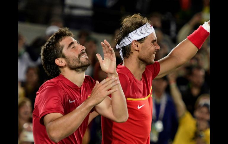 Nadal y Marc López obtuvieron así el primer premio para España en tenis en Río 2016. AFP / J. Soriano