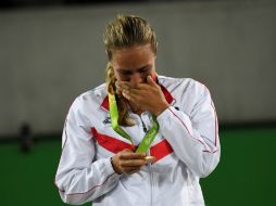 Puig se convirtió además en la primera mujer que gana un metal por la isla. AFP / M. Bernetti