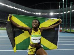 Elaine Thompson celebra su triunfo este sábado. AP / M. Slocum